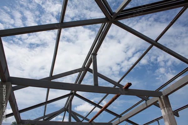 Fototapeta the structural steel structure of a new  home