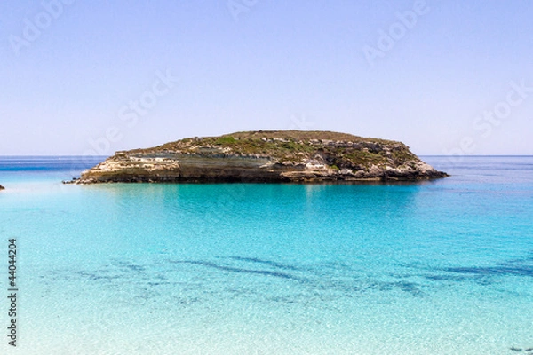 Obraz Pure crystalline water surface around an island (Lampedusa)
