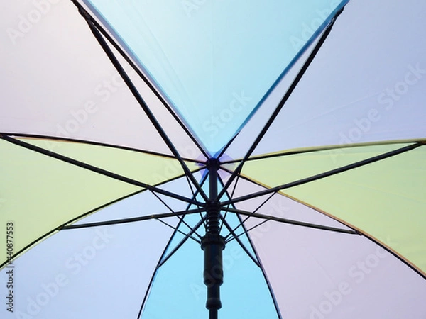 Obraz under of open colorful umbrella