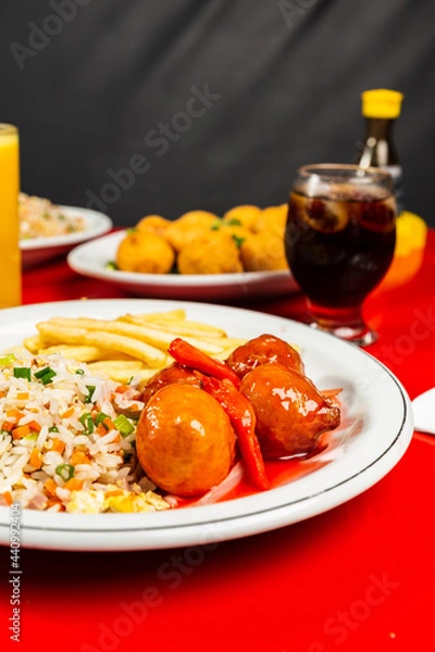 Obraz 
Delicious Meal Plate Dish Japanese Seafood Menu Fried Rice Teriyaki On a Red Table