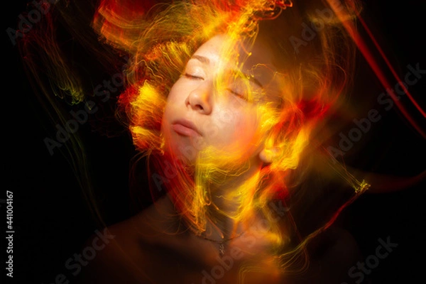 Fototapeta lightpainting portrait, new art direction, long exposure photo without photoshop, light drawing at long exposure	
