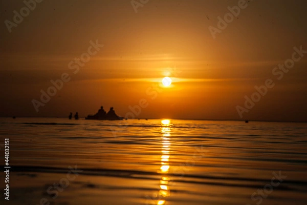 Obraz Summer sunset at sea. A resort place to relax at sunset. text place.