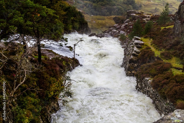 Fototapeta Torrent in river after storm