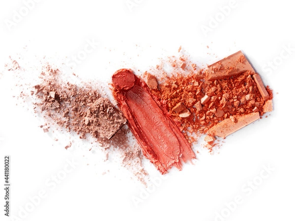 Obraz On a white background are broken blush for the face or eye shadow and smeared pink lipstick. A palette of shades. Cosmetic swatches. Decorative cosmetics on a white background. Eye makeup product.