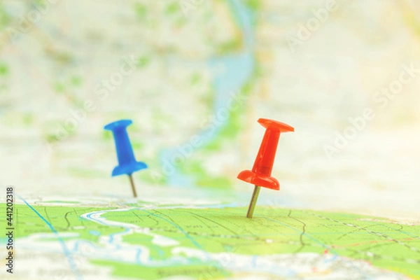 Fototapeta Travel map with navigation markers on it, selective focus photo