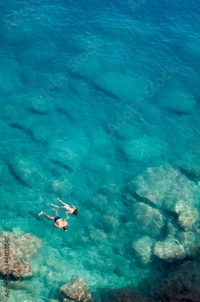Fototapeta Couple diving topview