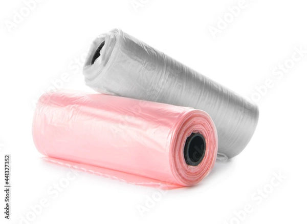 Fototapeta Rolls of pet waste bags on white background