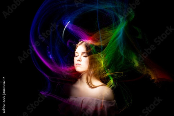 Fototapeta lightpainting portrait, new art direction, long exposure photo without photoshop, light drawing at long exposure	
