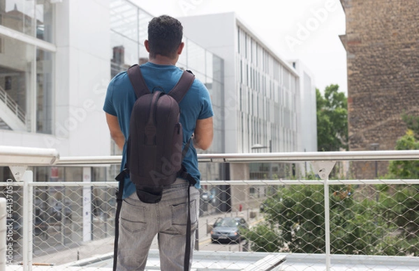 Obraz Latin tourist man in Europe with his smartphone