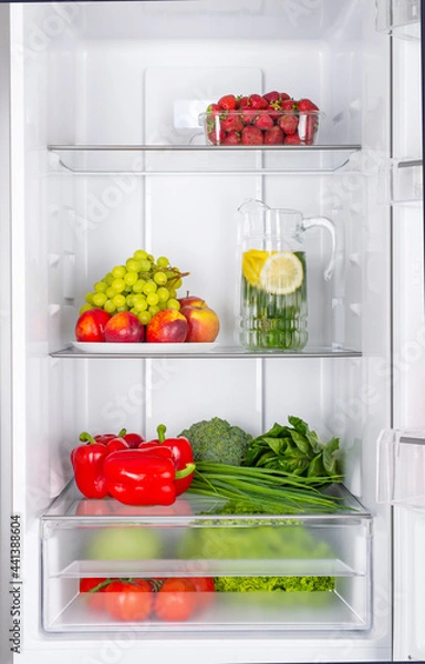 Obraz Open fridge full of fresh fruits and vegetables