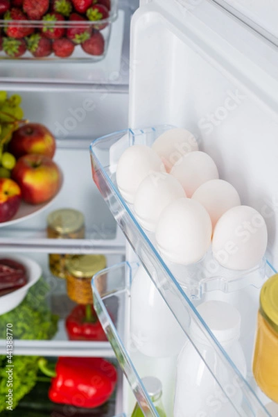 Obraz Open fridge full of fresh fruits and vegetables