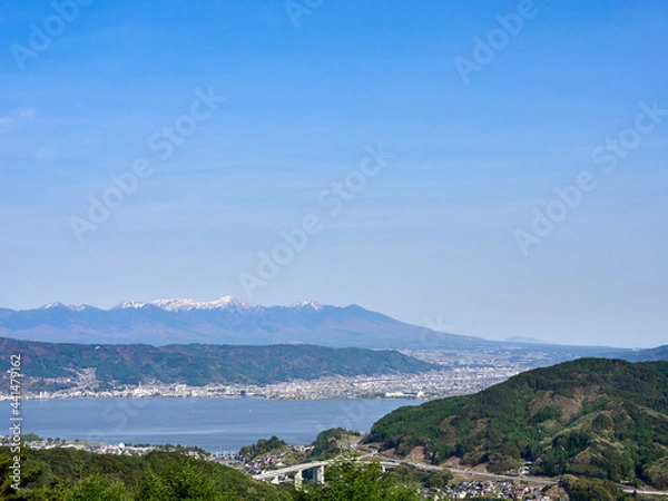 Obraz 5月上旬、岡谷市の塩嶺王城パークライン展望広場から八ヶ岳・諏訪湖を望む