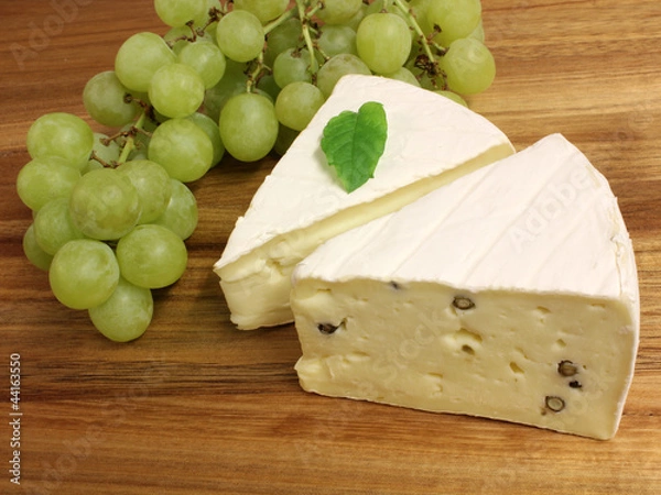 Fototapeta Käse und Weintrauben