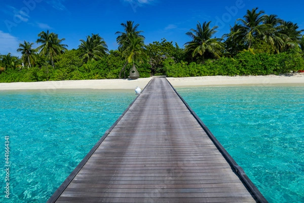 Fototapeta Wooden walkway across beach, South Ari Atoll, Maldives