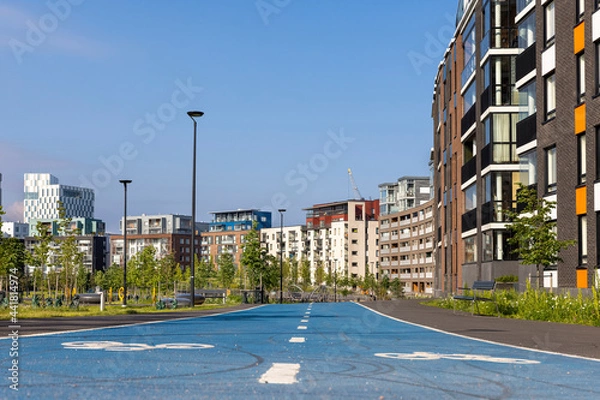 Fototapeta Bikers path marked with blue colour in Southern Helsinki