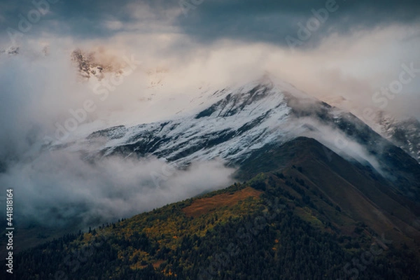 Obraz Clouds in the Snowy Mountains