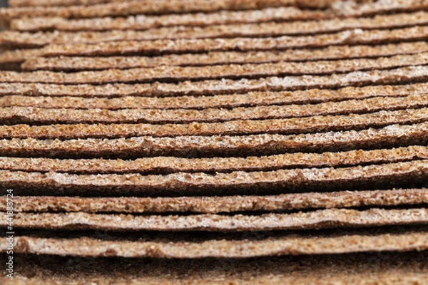Fototapeta dry crusty bread from rye flour
