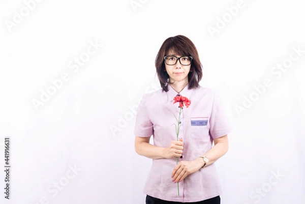 Obraz 花を持つ女性