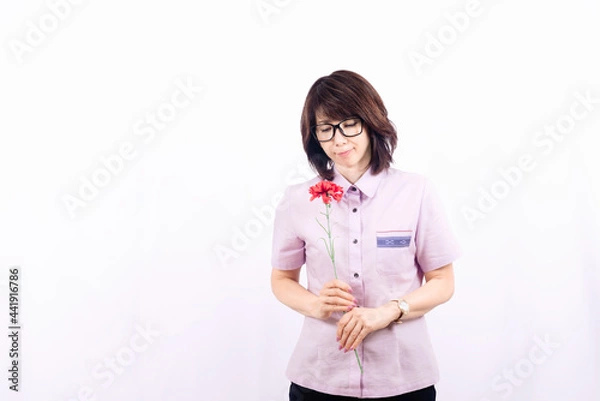 Obraz 花を持つ女性