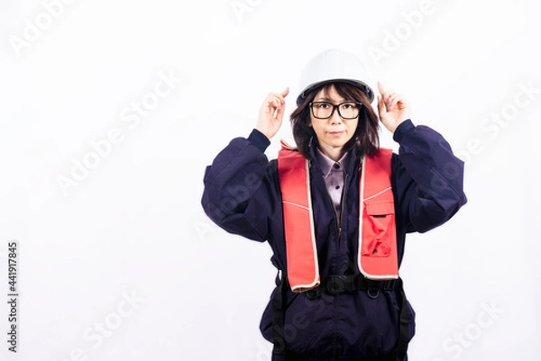 Obraz ヘルメットを指差すエンジニアの女性