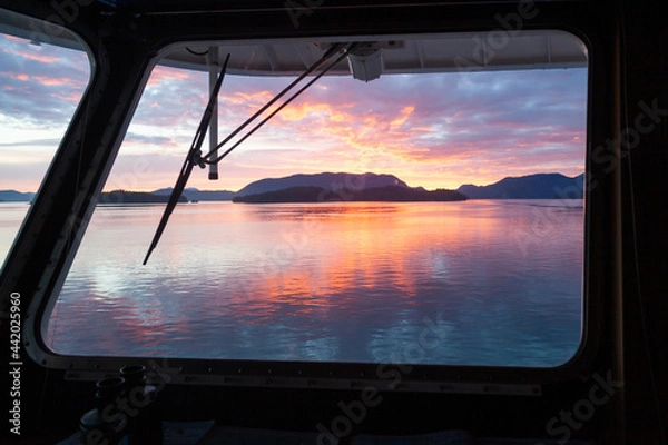 Obraz Colorful sunset from ship's bridge