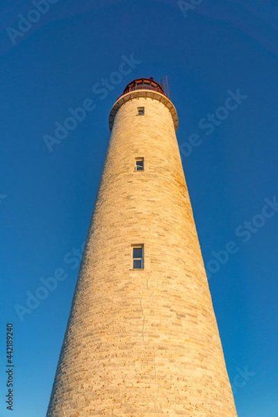 Fototapeta Close up view of the tower and the beacon of the Cap des Rosiers lighthouse, the highest in Canada, located near Forillon National Park n Quebec