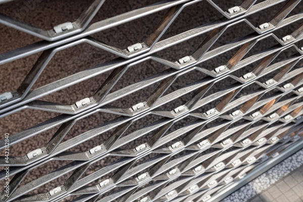 Obraz Shop window protected by iron grilles