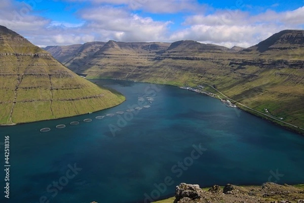 Fototapeta Hike on Klakkur Mountain with a great, panoramic and scenic fjordscape over Faroe Islands