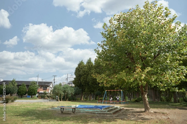 Obraz ブランコで遊ぶ女子高生