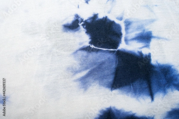 Obraz White fabric with blue tie dye stain. Background or texture