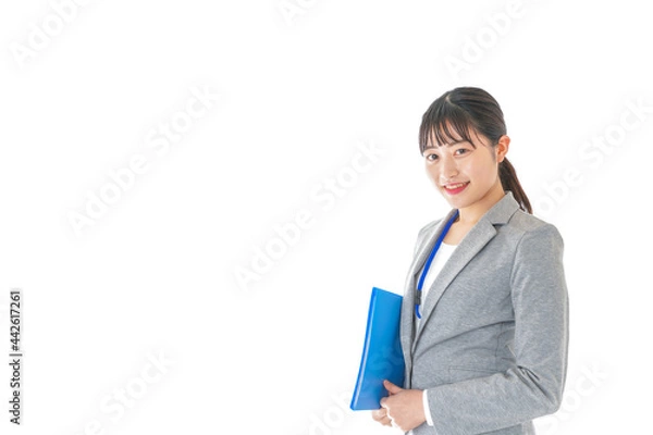 Fototapeta 書類を持つビジネスウーマン