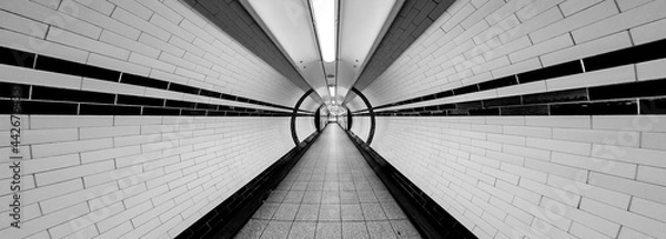 Fototapeta Tunnel Super Wide Angle of Tunnel Symmetrical Walkway with tiles on the ceiling and floor and walls
