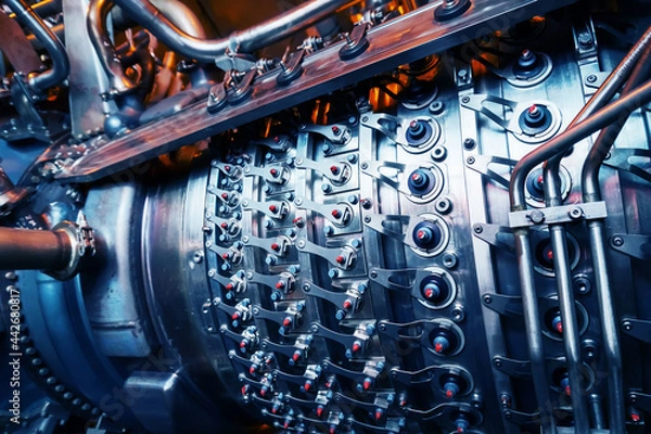 Fototapeta Electric generating engine of a gas pumping unit. A huge turbine in the enterprise for clean energy.