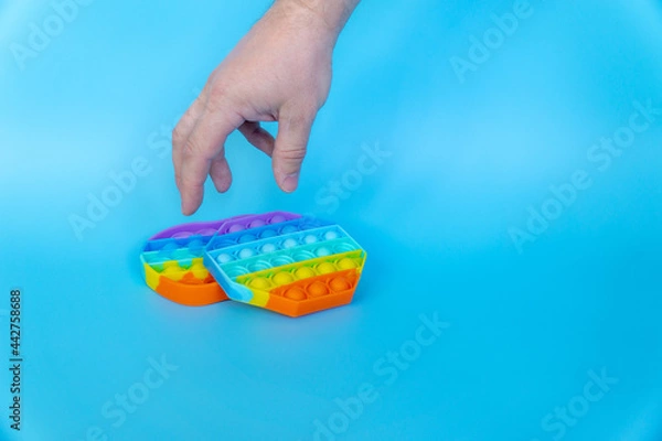 Obraz colorful silicone antistress sensory toy fidget push pop it