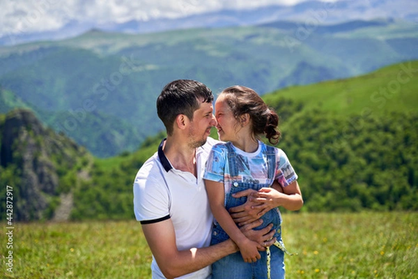 Fototapeta dad and daughter hug and happy