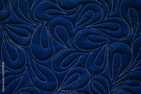 Obraz Close up texture of quilting by free-motion machine technique. on dark blue clothes Background