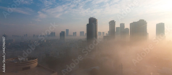 Obraz Heavy fog in Tel Aviv. Panorama above. The city over the clouds