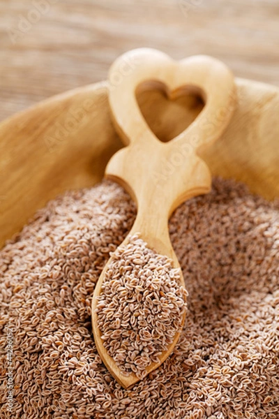Fototapeta Lovage Seeds, Ajwain Seeds, Carom Seeds in wooden plate with hea