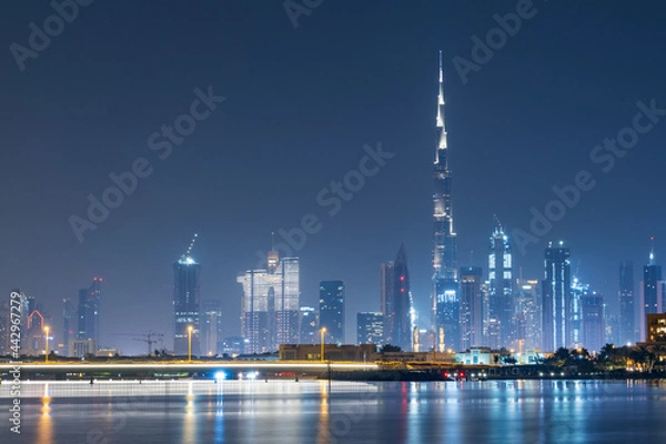 Obraz night lights above Dubai city with view from bay