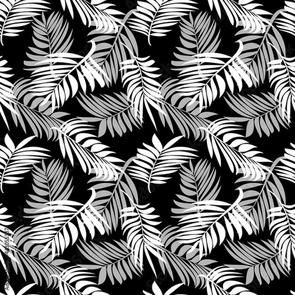Fototapeta Tropical palm leaves. Seamless modern pattern with exotic plants for textiles, fashionable fabrics, bed linen, decorative pillows, photo wallpaper, interior design. White and black. 