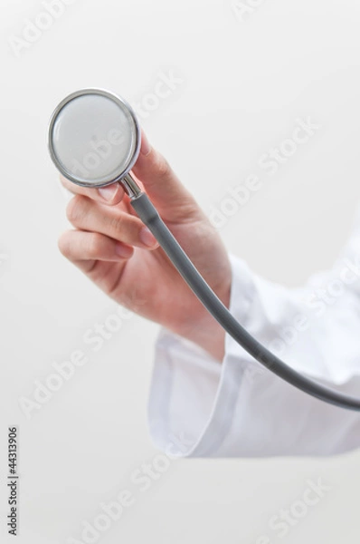 Obraz Hand holding stethoscope
