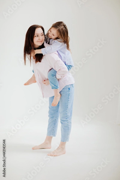 Fototapeta  Mom and daughter play and have fun. beautiful happy family