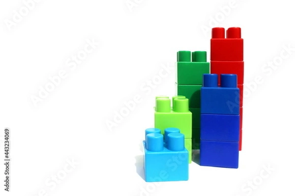 Fototapeta Constructor of different colors built in ascending order on a white isolated background