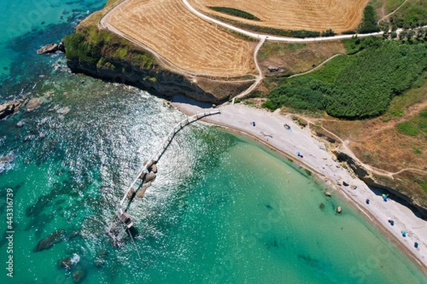 Fototapeta The Punta Aderci Nature Reserve was established in 1998. It offers one of the most beautiful stretches of coast in Abruzzo and Italy with traditional fishing platform Trabocchi. Italy Vasto 