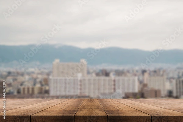Fototapeta 3D rendering, wooden top table on isolate light and blurred background 