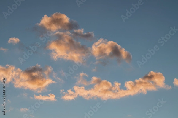Obraz clouds at sunset on blue sky