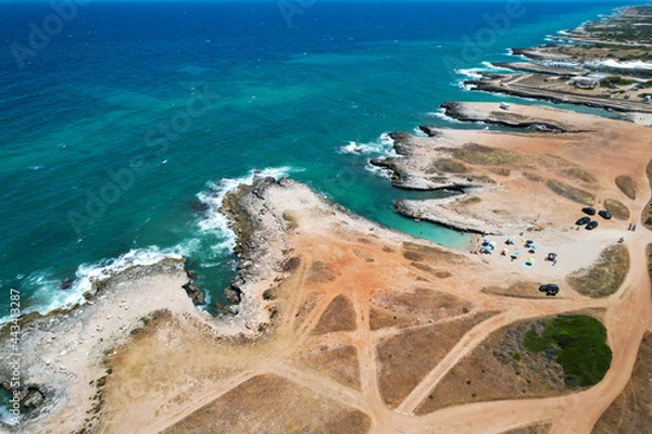 Fototapeta Costa Merlata, Ostuni photographed with drone from above. It offers one of the most beautiful stretches of coast in Puglia and Italy with little gulfs and sandy beaches. Italy Ostuni 