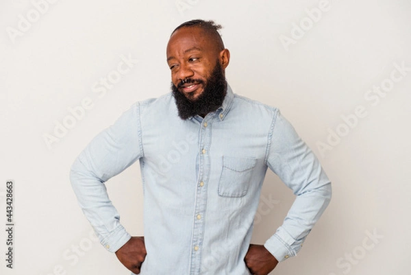 Obraz African american man with beard isolated on pink background dreaming of achieving goals and purposes