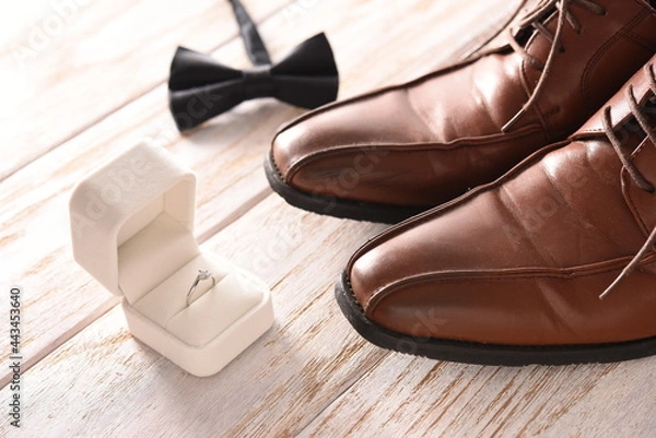 Obraz 婚約指輪とブーツと蝶ネクタイ