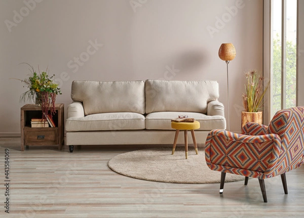Fototapeta Modern sofa in the light wall concept with lamp and carpet design.